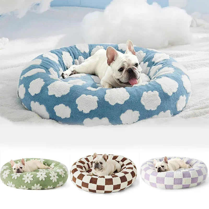 Small dog resting in a cozy and soft dog bed