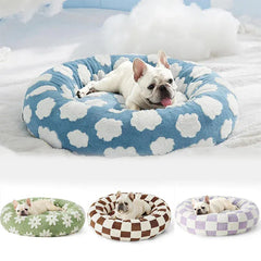 Small dog resting in a cozy and soft dog bed
