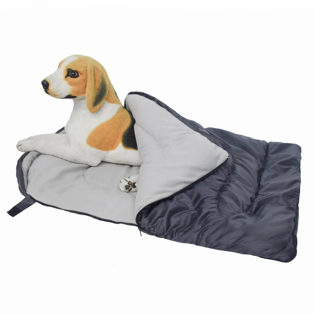Dog relaxing on soft waterproof bed after playing in mud