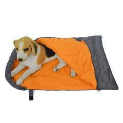 Dog resting on a waterproof bed designed for indoor and outdoor use
