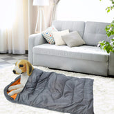Waterproof dog bed with durable cover protecting against spills and accidents