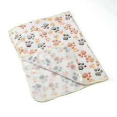 Pet blanket with non-slip backing on couch for protection