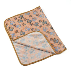 Soft waterproof pet blanket for dogs and cats on bed