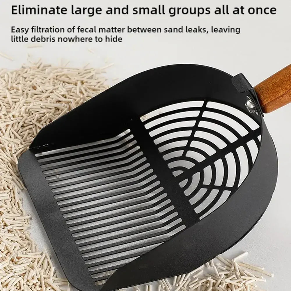 Heavy-duty metal cat litter scoop removing clumps efficiently