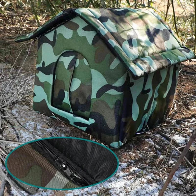 Cat resting inside waterproof winter-proof outdoor shelter